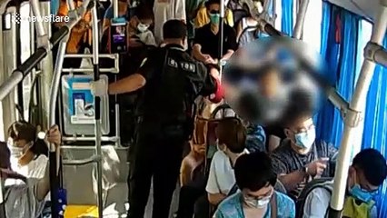 Brave bus inspector fends off knife-wielding passenger in China