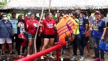 Thai locals hold 'boxing on pole' event to celebrate easing of Covid-19 restrictions