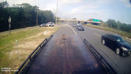 Man clips truck and crashes into a flat bed tow truck in New Jersey