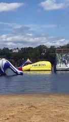 Girl Catches Massive Air from Fat Boy Float at Water Park
