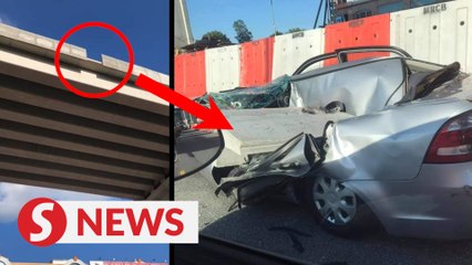 Woman's lucky escape after large piece of concrete falls on her car
