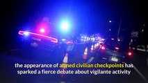 Armed civilian roadblocks in Oregon town fuel fears over vigilantism