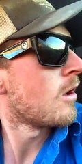 Two Dogs Sitting on Lawn Chairs Startles Man