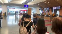 Cien taiwaneses toman un vuelo a ninguna parte para experimentar la 