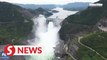 Hydropower station opens sluice gates to battle floods in Guizhou, China