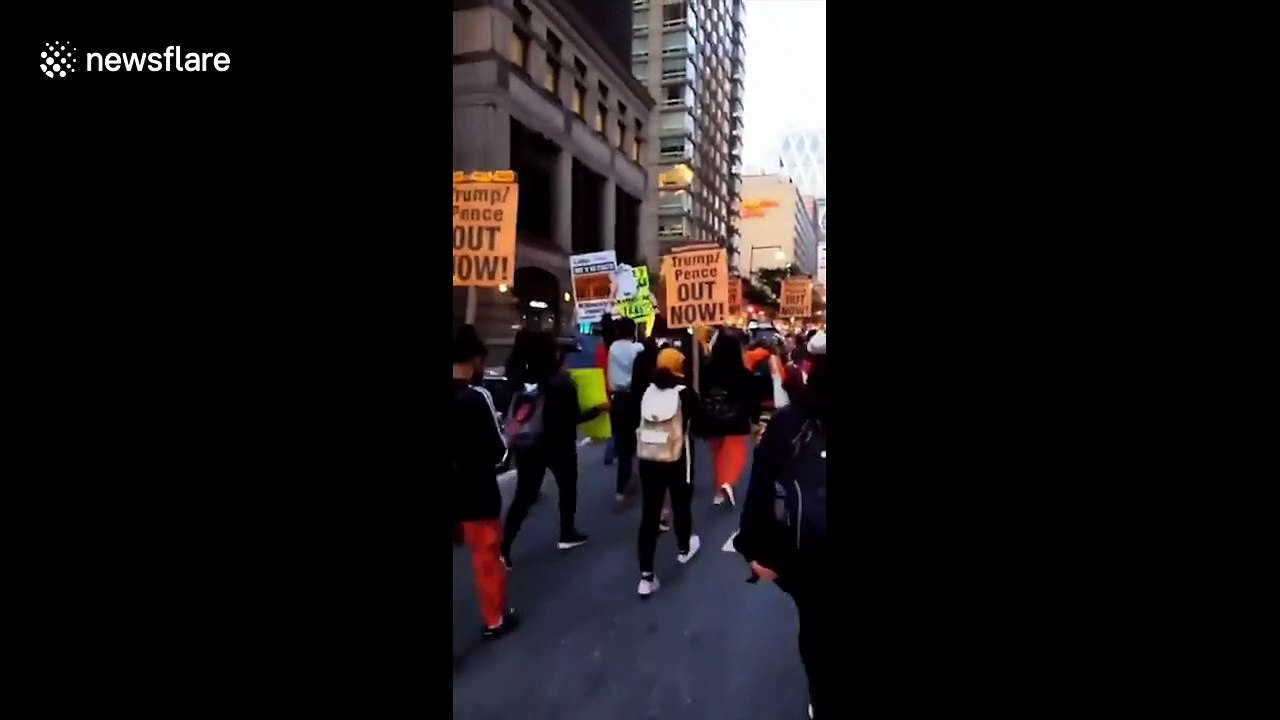 Anti-Trump demonstrators protest ahead of election in front of president's hotel in NY