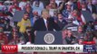 Trump welcomes suspended high school footballers on stage in Ohio
