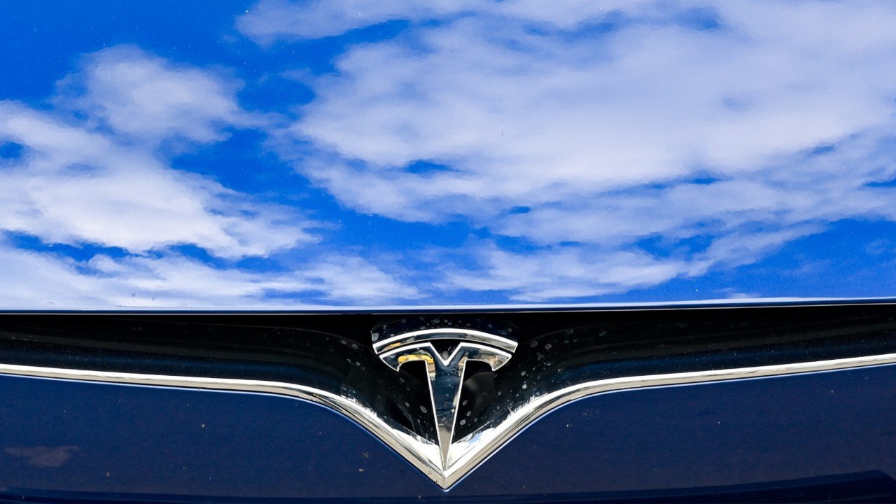Tesla Slides 7%, Investors Wait