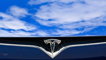 Tesla Slides 7%, Investors Wait