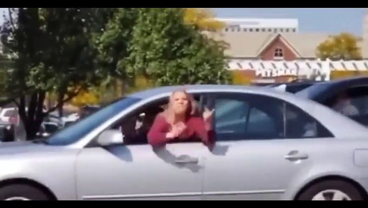 INSTANT KARMA: Anti-Trump psycho screams at MAGA rally while driving.  Forgets she is driving car