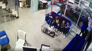 Dad shields his three kids from gunfire inside car dealership