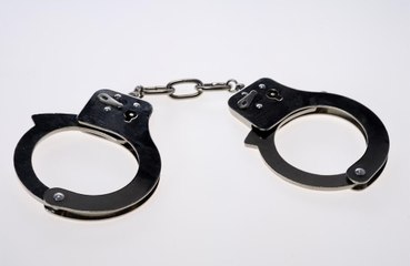 Police free man trapped in handcuffs