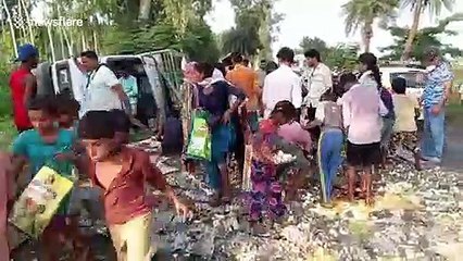 Residents scramble as truck carrying 50,000 eggs overturns in northern India