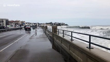 Watch as Hurricane Teddy pounds the New Hampshire coast soaking cars and people in it's path