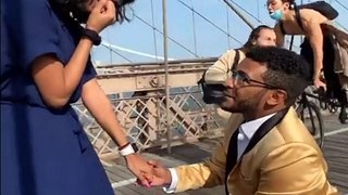 BROOKLYN BRIDGE PROPOSAL GOES WRONG AS CYCLIST CRUSHES PHOTOGRAPHER