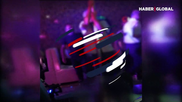 Yasağa rağmen açılan gece kulübünde tedbirleri hiçe sayan iki adam direk dansı yaptı