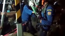 Rescuers rappel down 65ft deep well to save stray kitten