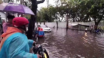 Thunderstorm floods roads in Bangkok, Thailand