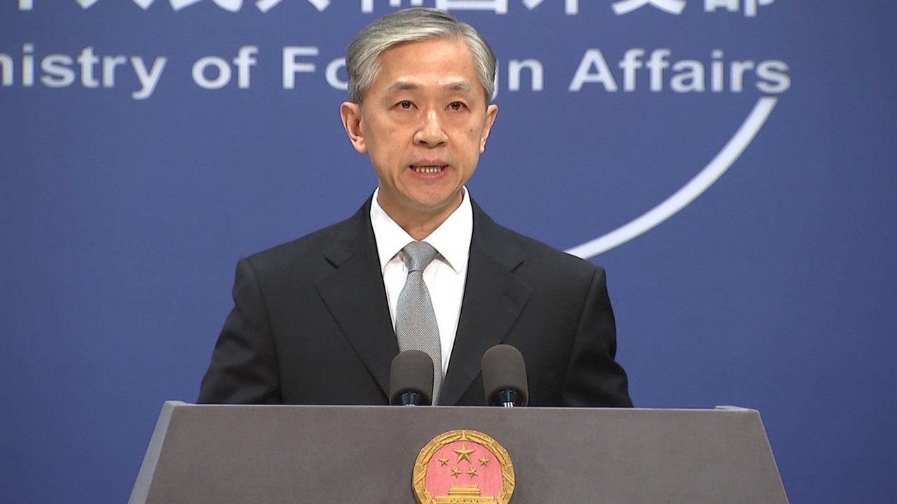 Banning entry to two Australian academics is "within China's sovereign right", Beijing says