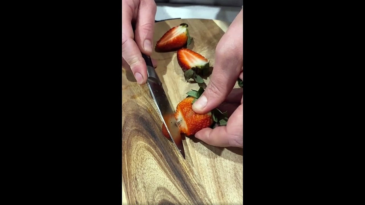 Supermarket pulls strawberries from its shelves after a shopper discovered a needle inside one piece of fruit