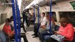 UK police officer enforces government's COVID-19 guidelines and remove man from tube for not wearing mask