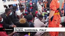 Alan Kurdi migrant rescue ship escapes rough seas and docks in Sardinia