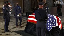 Ruth Bader Ginsburg's personal trainer performs push-ups in front of casket