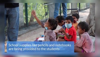 Indian couple run street-side classes for poor students