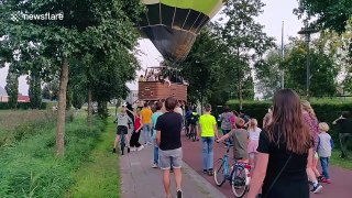 Heroic bystanders save hot air balloon from crash landing in Netherlands