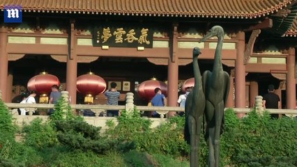 Domestic tourists begin trickling back into Wuhan, China