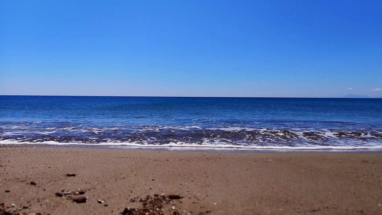 Beach Aerial shot over a sandy coastline natural beautiful royalty Free Stock no copyright video Free for commercial use dron dron aerial view (2)