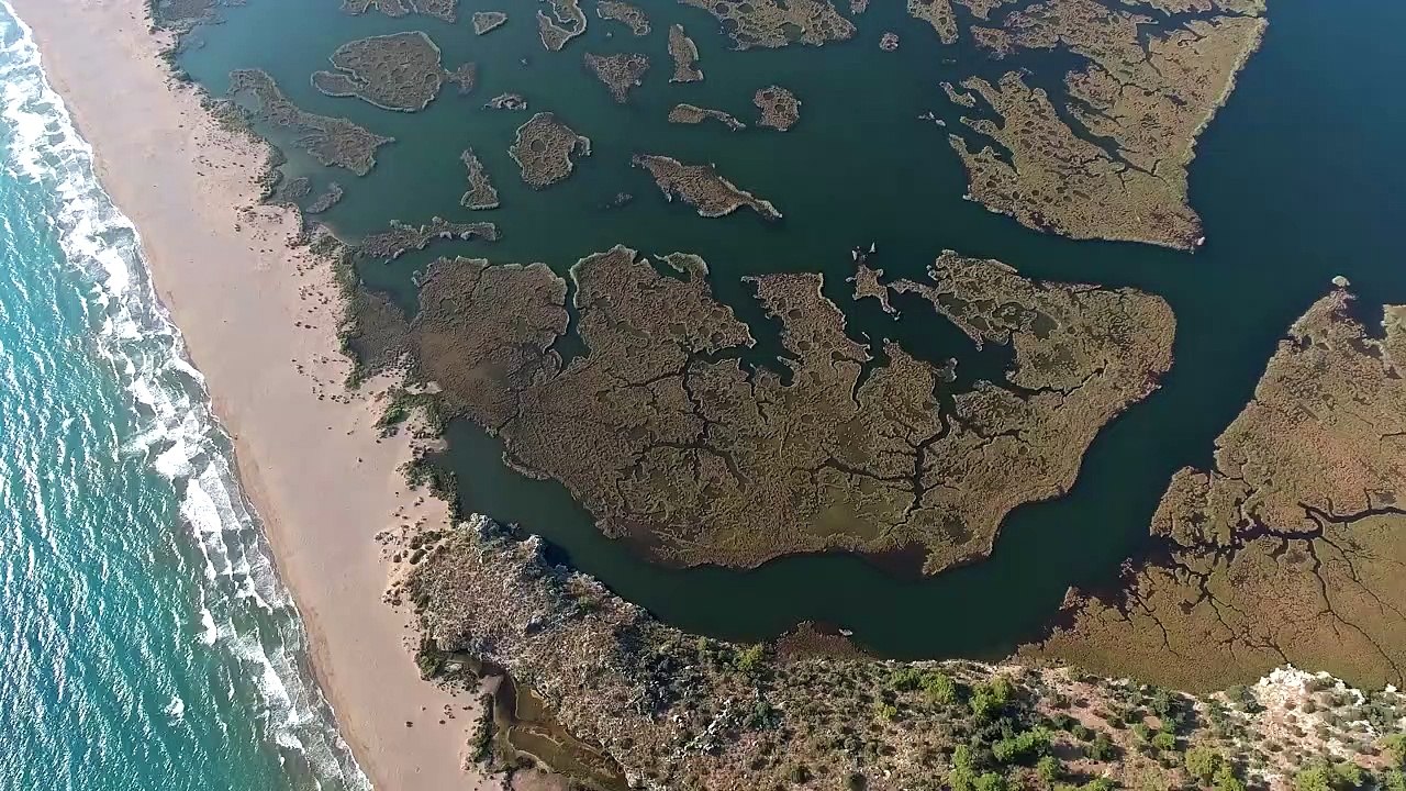 Beach and land formationsnatural beautiful royalty Free Stock no copyright video Free for commercial use dron dron aerial view