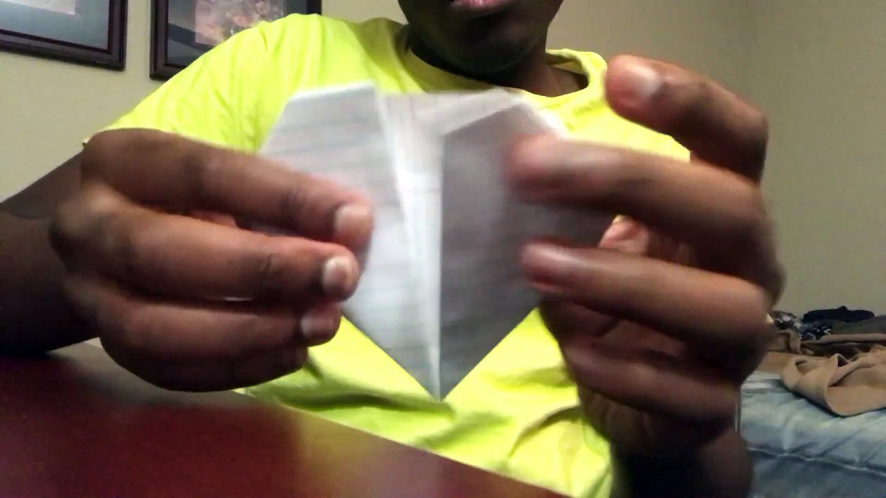 Making a heart with long paper.