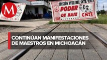 Maestros toman casetas, oficinas y vías ferroviarias en Michoacán
