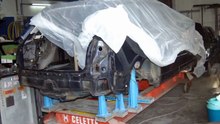 Audi A4 collision repair with Celette frame machine and dedicated Audi jigs