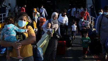 Greece moves hundreds of refugees from Lesbos to mainland