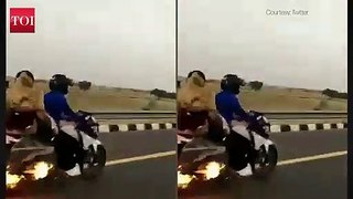 Miraculous escape for couple on a bike