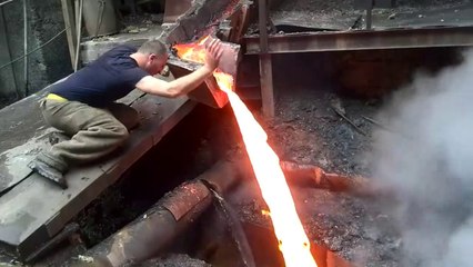 Man Puts Hand In Molten Metal