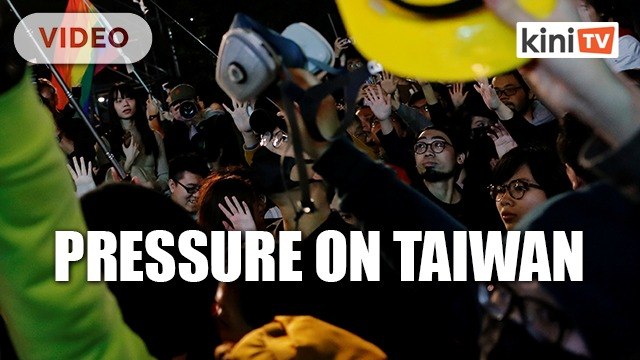 Flight of Hong Kong protesters piles pressure on Taiwan