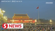 Flag raising ceremony at Tian'anmen Square in Beijing on National Day