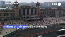 TIMELAPSE: Travellers at train stations for Golden Week holidays in China