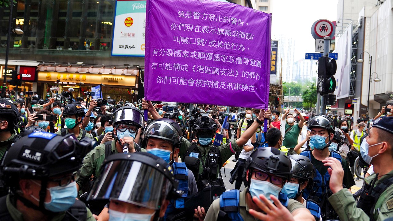 Massive police presence blunts Hong Kong protests on China’s National