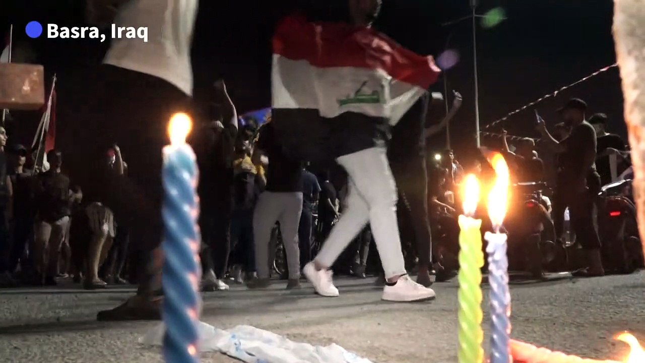 Iraqis in Basra march for slain protesters on uprising anniversary