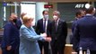 German Chancellor Merkel backs away from Italy's Conte as he tries to say hello