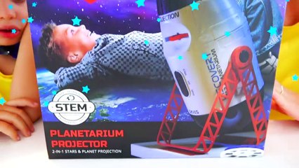 Niki wants to find planets and builds toy robots