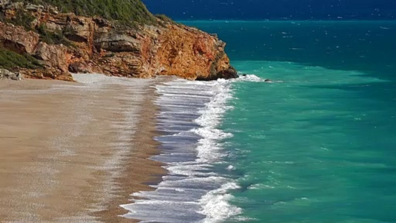 Beautiful deserted beach and a turquoise oceannatural beautiful royalty Free Stock no copyright video Free for commercial use dron dron aerial view