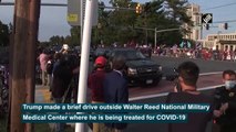 Donald Trump waves at supporters outside Walter Reed National Military Medical Center
