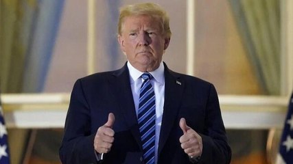 Donald Trump returns to White House, removes mask to pose for photos