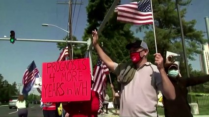 Trump makes 'surprise visit' to supporters outside hospital