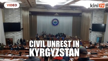 Kyrgyzstan on edge of chaos after opposition storms government buildings